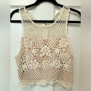 Like New! Alice and Olivia crochet top with nude lining and back zip.
